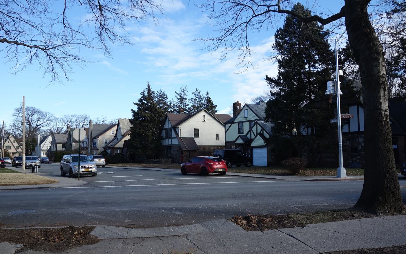 Single-family houses on a corner in Addisleigh Park, Southeast Queens
