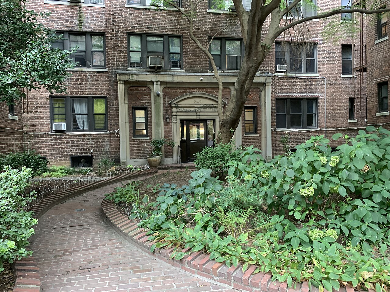 Entrance of a prewar apartment building on 35th Avenue in Jackson Heights, Queens.